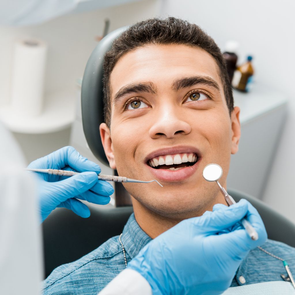 checking dental patient